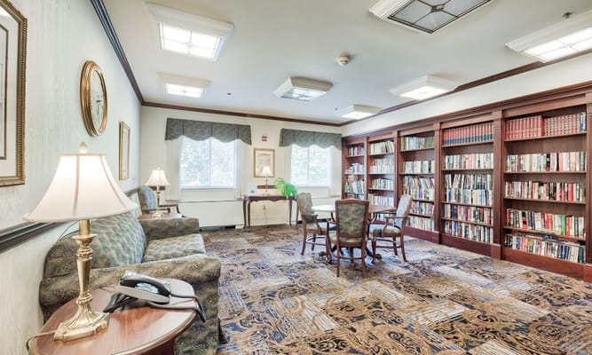 Living room with bookshelves and seating