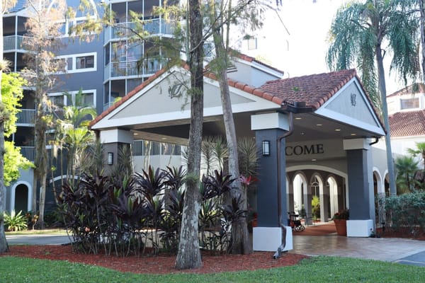 Entrance of Forest Trace Senior Living with landscaping