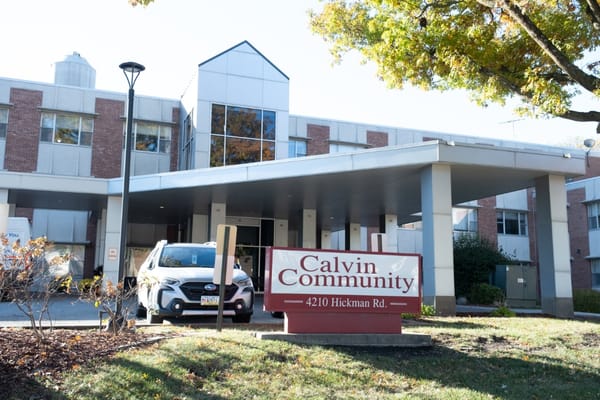 Exterior view of Calvin Community facility with sign