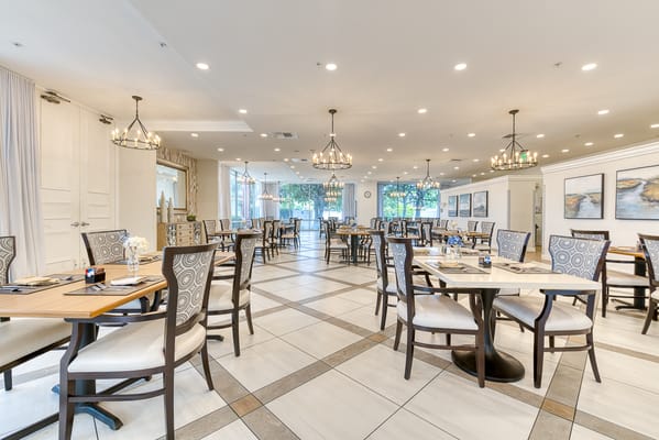 Bright dining room with elegant table settings