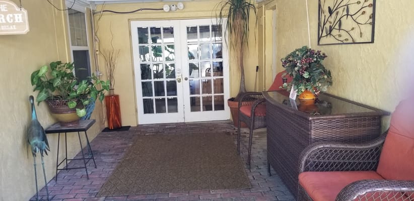 Cozy interior common area with seating and plants