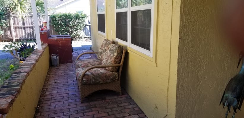 Outdoor seating area with colorful plants