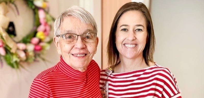 Happy residents posing together in the facility