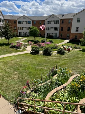 Beautiful garden area with walking paths and flowers