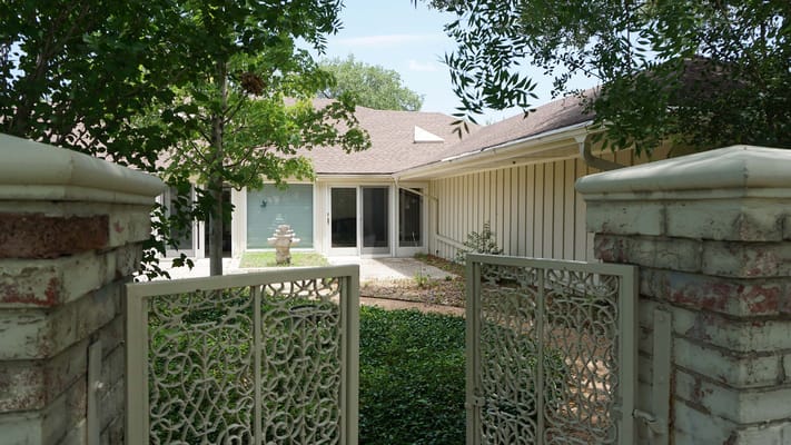Entrance gate to a serene garden area