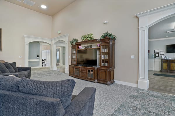 Interior lounge area with seating and TV