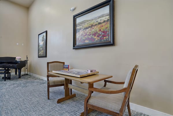 Interior view of a common area with a table and chairs