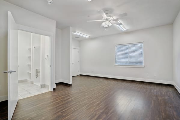 Spacious resident room with a bathroom and natural light