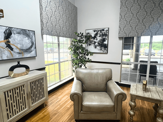 Cozy common area with seating and artwork