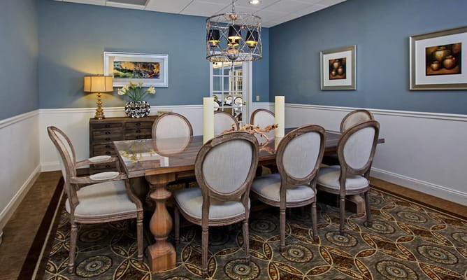 Elegant dining room with a large table and decorative accents