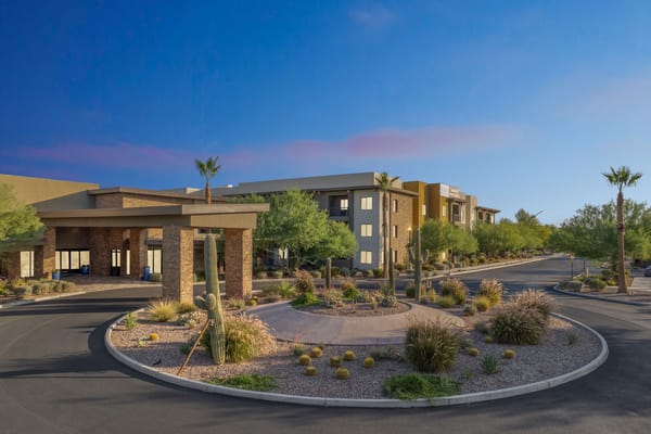 Entrance view of Inspira Arrowhead facility with landscaping