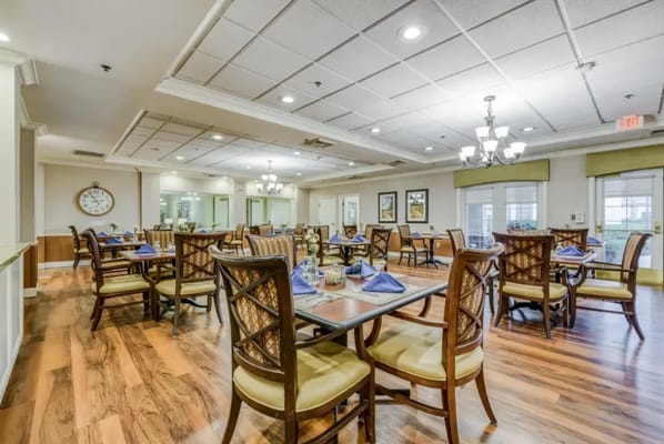 Dining room with tables set for meals