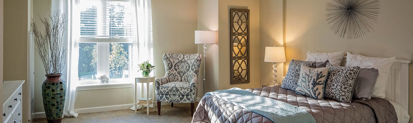 Well-decorated private resident room with natural light