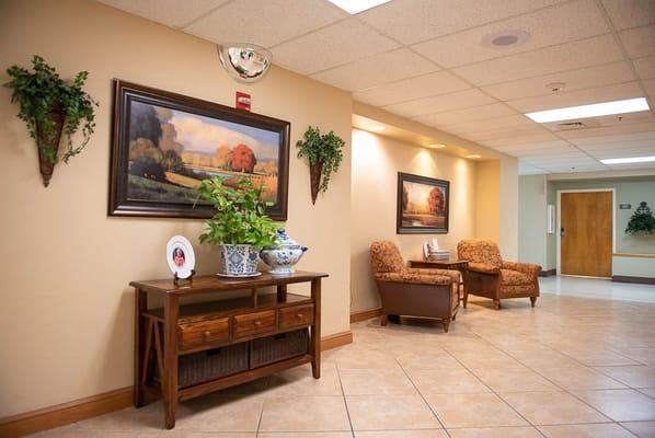 Bright common area with art and seating