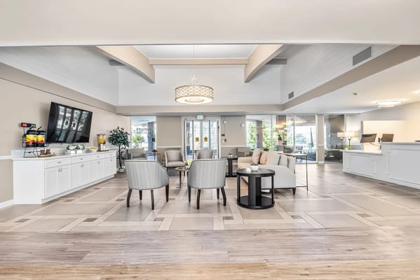 Bright lobby area with seating and decor