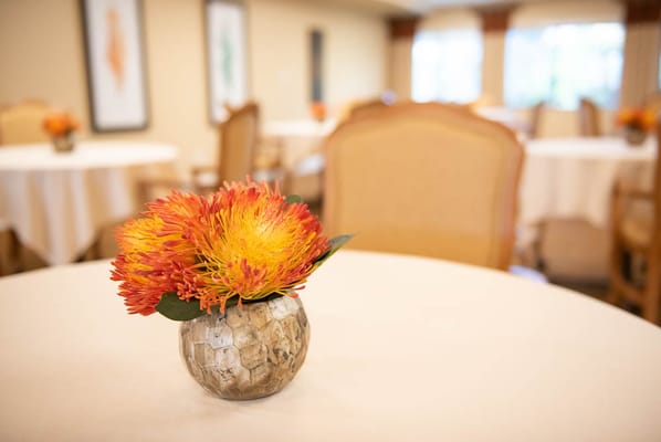 Table decor with a flower arrangement in a common area