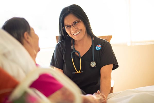 Nurse interacting with a resident