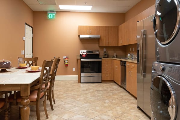 Interior view of a kitchen area with dining table