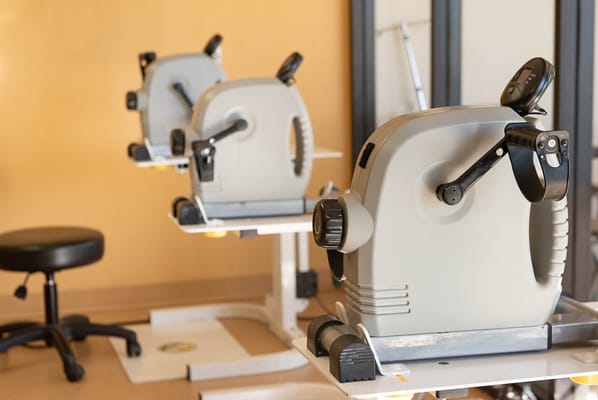 Therapeutic exercise equipment in a fitness room