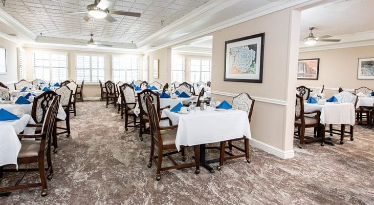Dining area with tables set for meals