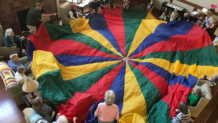 Residents engaging in a colorful group activity
