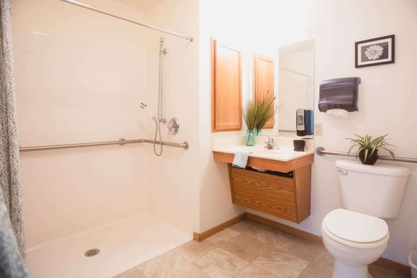 Brightly lit bathroom with safety features