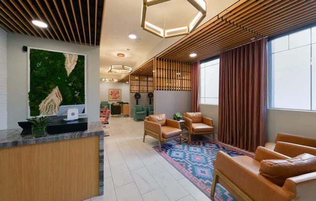 Interior common area with seating and natural decor