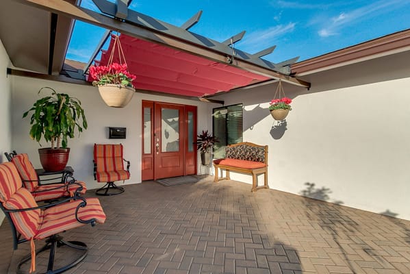 Welcoming outdoor seating area with flowers