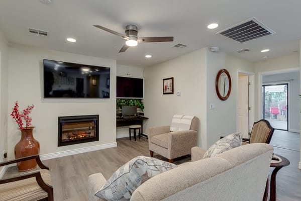 Cozy lounge area with comfortable seating and fireplace