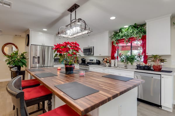 Bright kitchen with plants and modern appliances