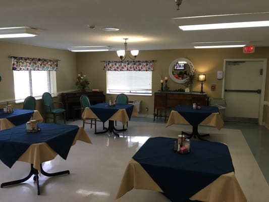 Dining area with tables set for a meal