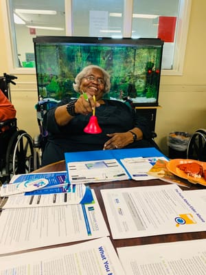 Resident engaging in an activity with materials