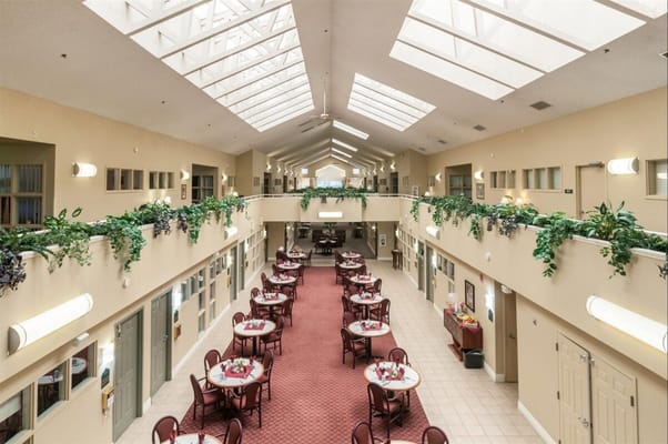 Common area dining space with tables and chairs