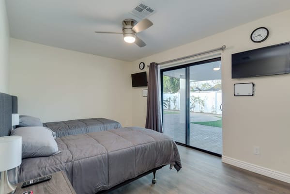 Private resident room with twin beds and patio access
