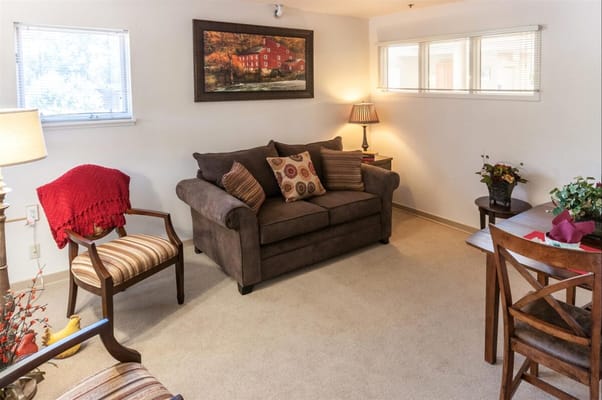 Cozy living area with a sofa and artwork