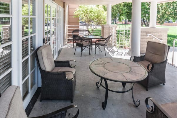 Outdoor seating area with chairs and tables