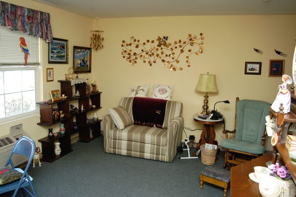 Cozy resident room with furniture and decorations