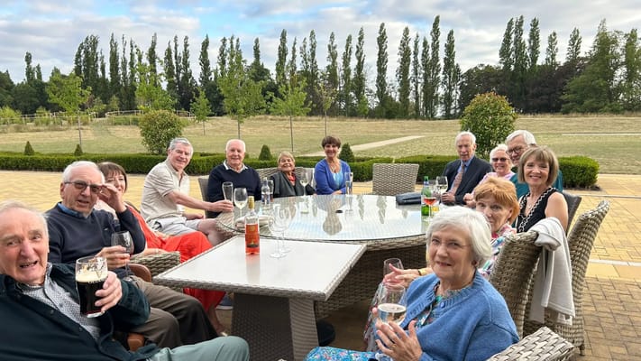 Residents enjoying drinks during an outdoor gathering