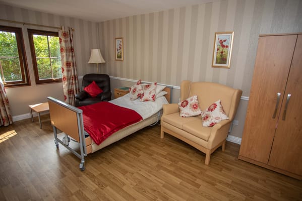 Cozy interior of a resident room with seating and decorations