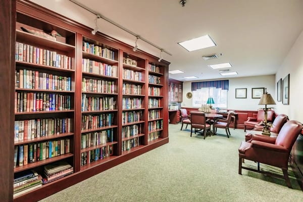 Interior library space with bookshelves and seating
