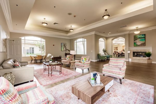 Bright common area with comfortable seating and natural light