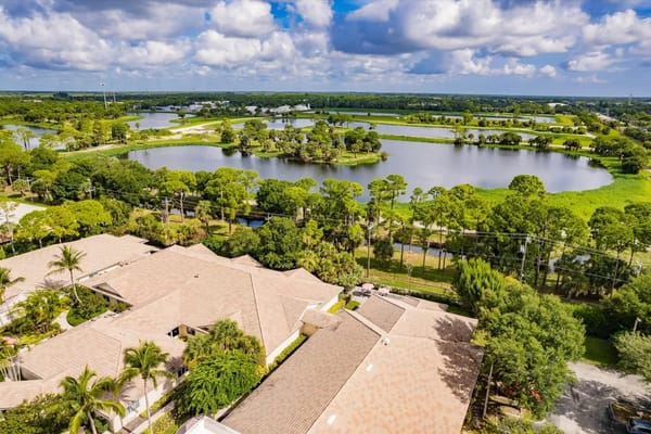 Aerial view of the facility's lush outdoor spaces and water features