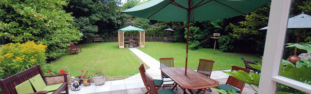 A serene outdoor garden space with seating