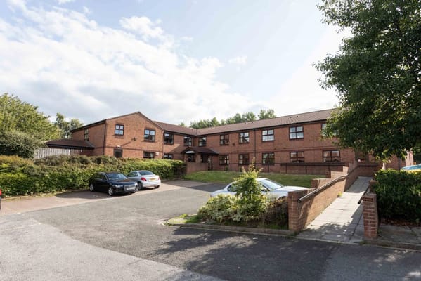 Exterior view of Marigold Nursing Home building