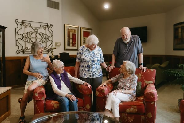 Residents enjoying conversation in a common area