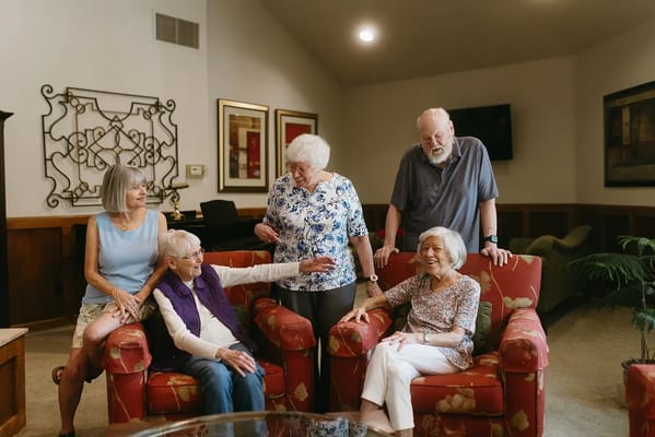 Residents enjoying conversation in a common area