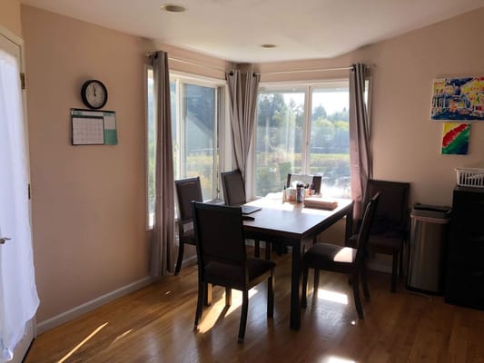 Interior dining area with a table and chairs