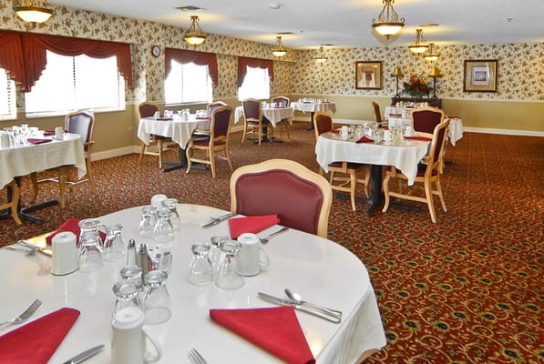 Dining room with tables set for meals