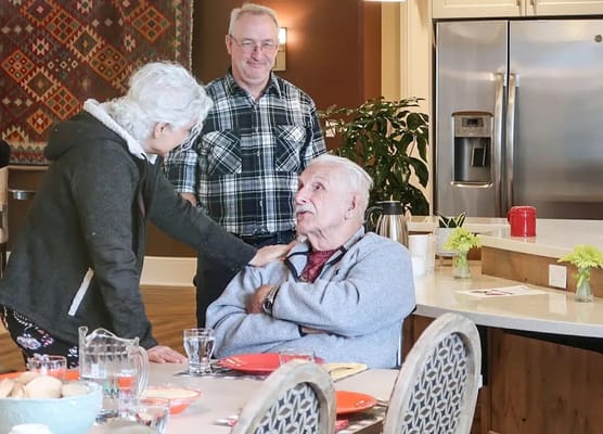 Residents enjoying breakfast in a dining area