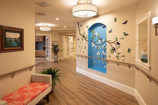 Brightly lit interior hallway with decorative elements